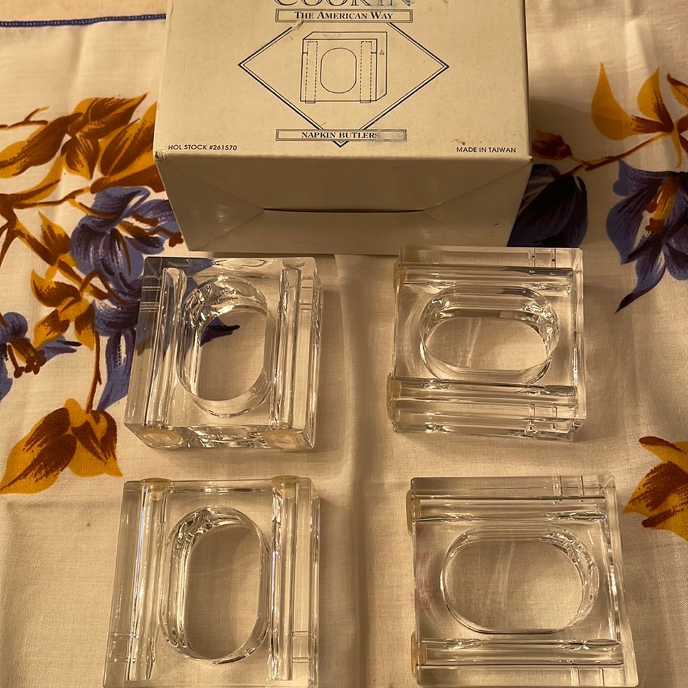 Four vintage Lucite napkin rings